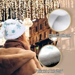 Vuxen vit tomteluva med julplyschhatt och blå snöflinga><noscript><img width=