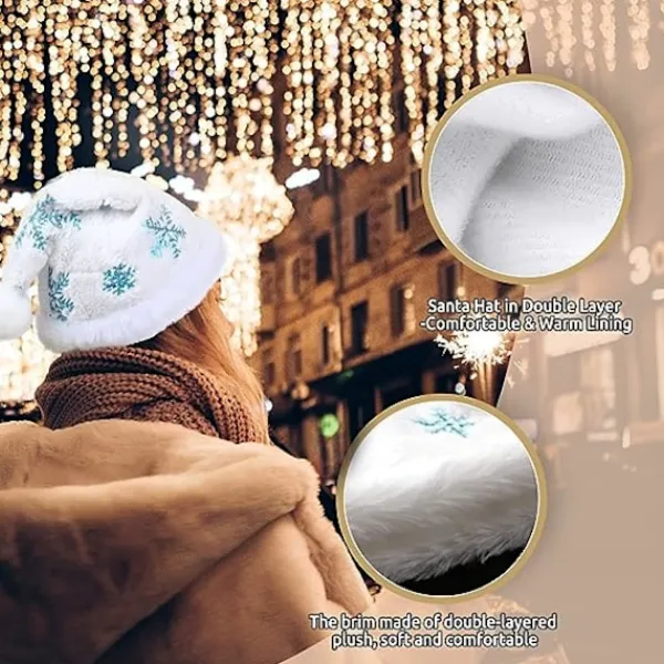 Vuxen vit tomteluva med julplyschhatt och blå snöflinga> Huvudbonader